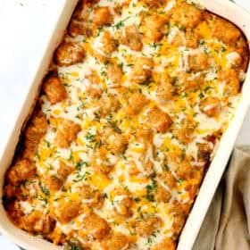 top view of tater tot casserole in a 9x13 baking dish