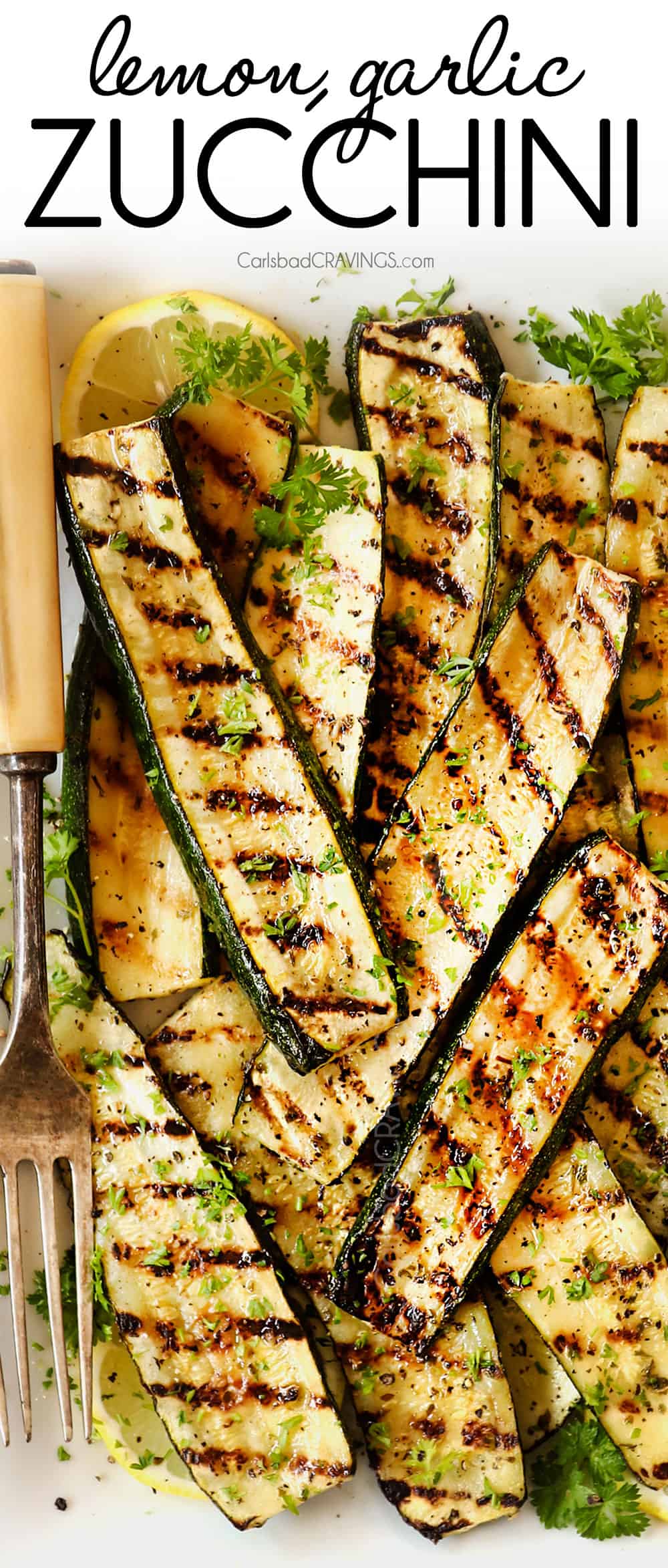 top view of grilled zucchini on a white platter
