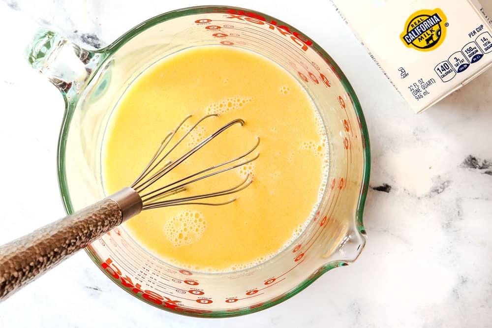 showing how to make cereal pancakes by whisking milk, melted butter, eggs and vanilla together