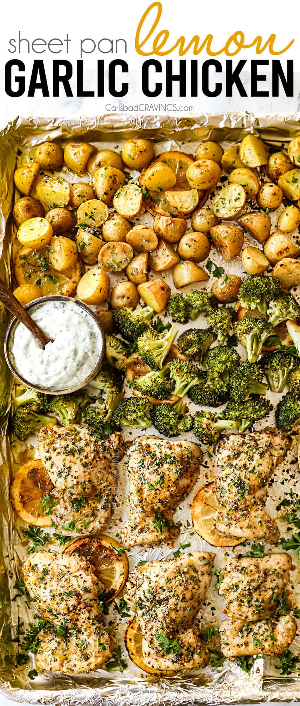 lemon garlic chicken thighs with broccoli and potatoes on a sheet pan baked in the oven