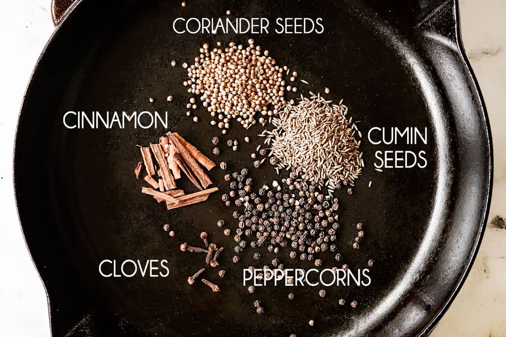 showing how to make birria by toasting spices in a skillet