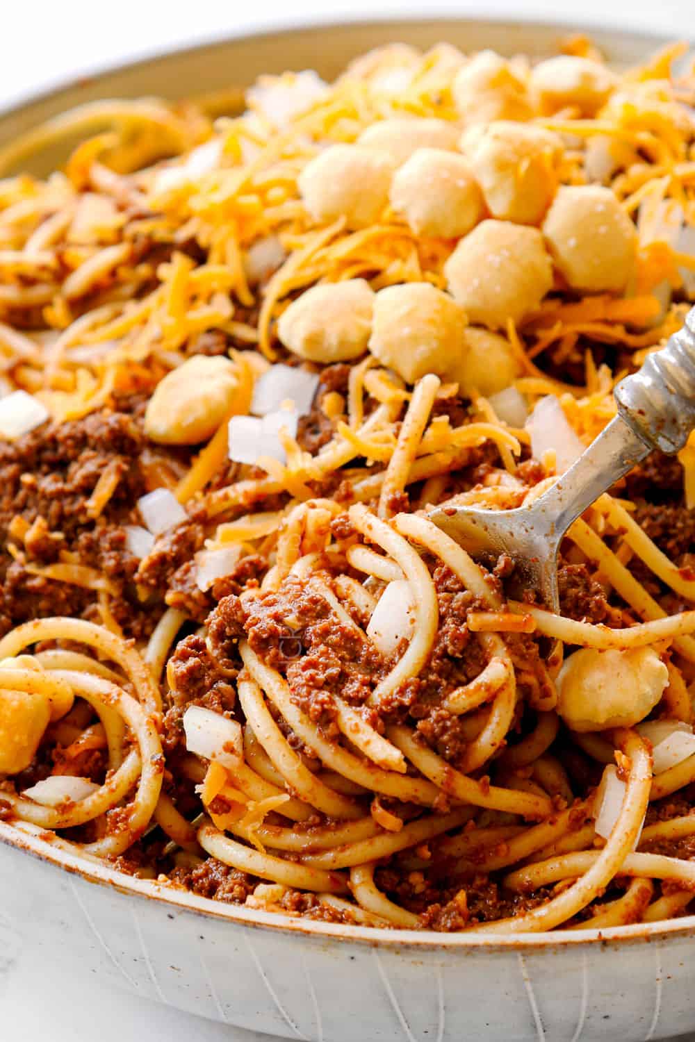 up close of Cincinnati chili on a fork