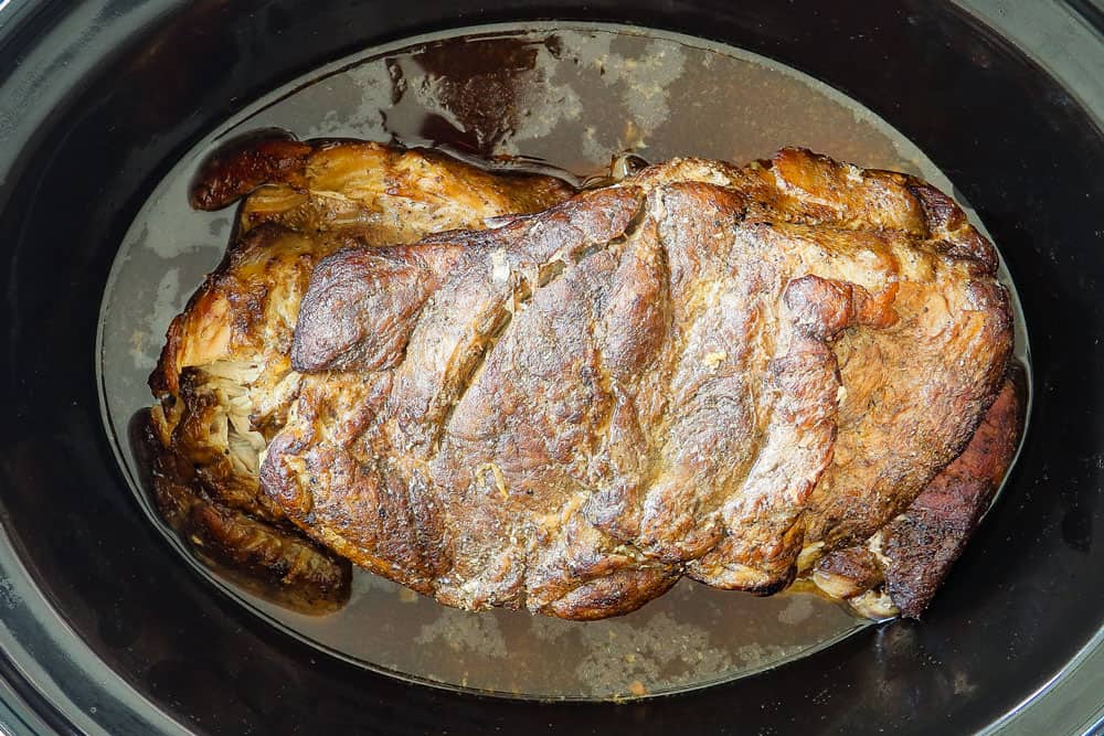 showing how to make Kalua Pork (Kalua Pig) recipe by cooking the pork in the slow cooker