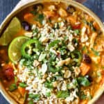 top view of African Peanut Stew with rice, cilantro and crushed peanuts