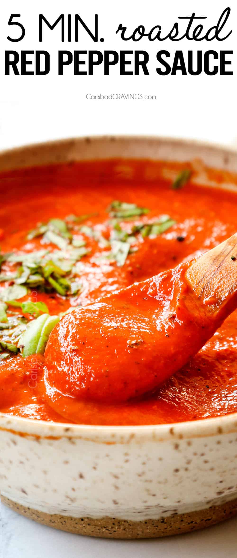 a spoonful of roasted red pepper sauce recipe showing how smooth it is