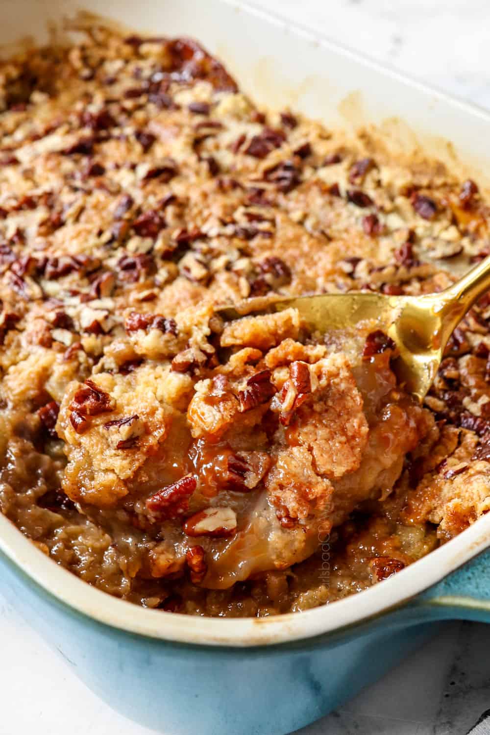 up close of a spoonful of apple dump cake