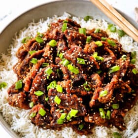 up close of Chinese ginger beef over rice showing how crispy the beef is