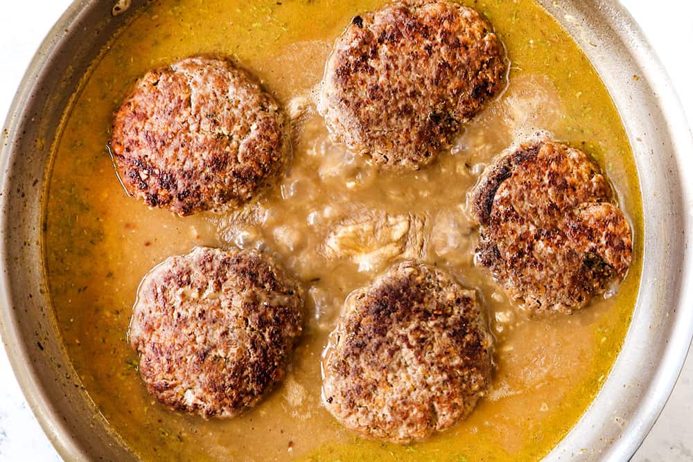 showing how to make Salisbury Steaks by adding patties to gravy and simmering until thickened
