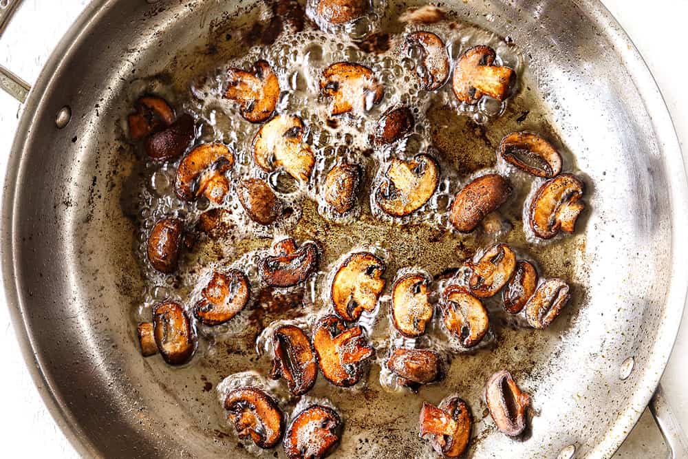 showing how to make homemade Salisbury Steak recipe by caramelizing mushrooms in a stainless steel skillet