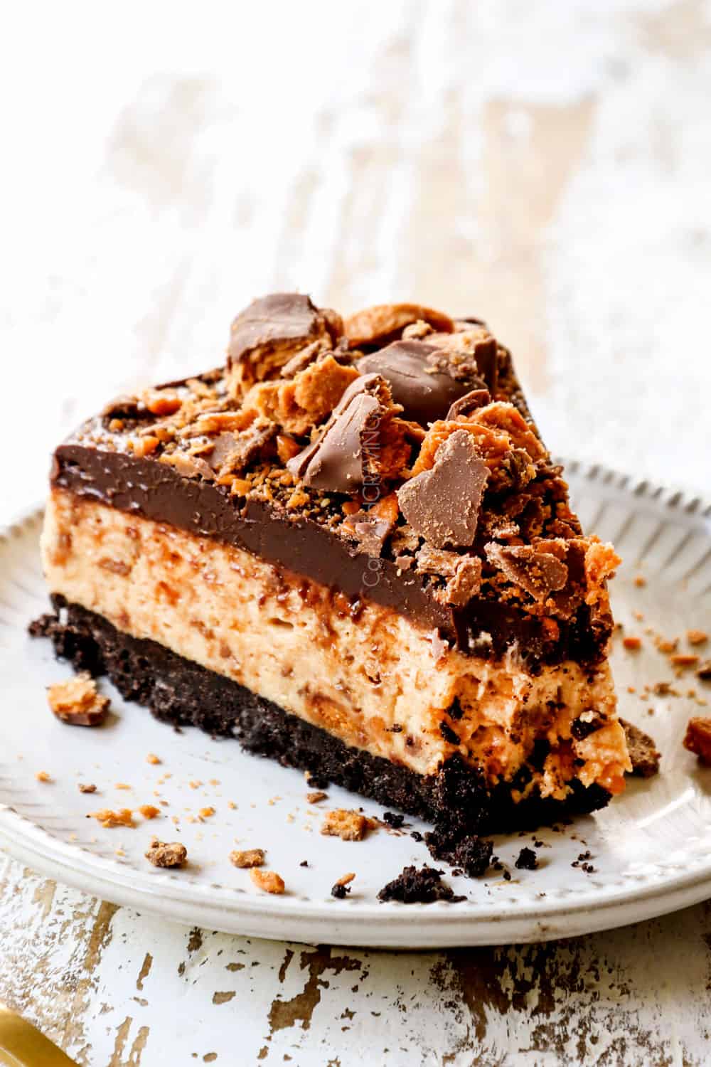 a slice of Butterfinger pie with a bite taken out of it inger