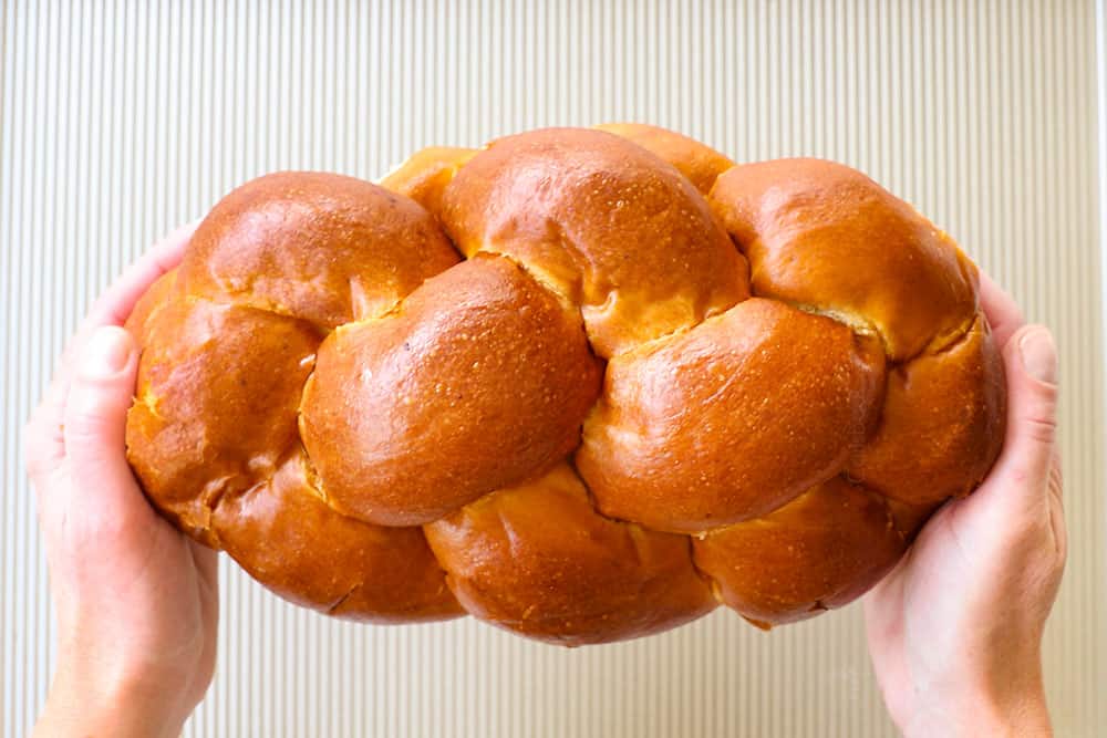 showing what bread to use for bread pudding with a loaf of brioche bread