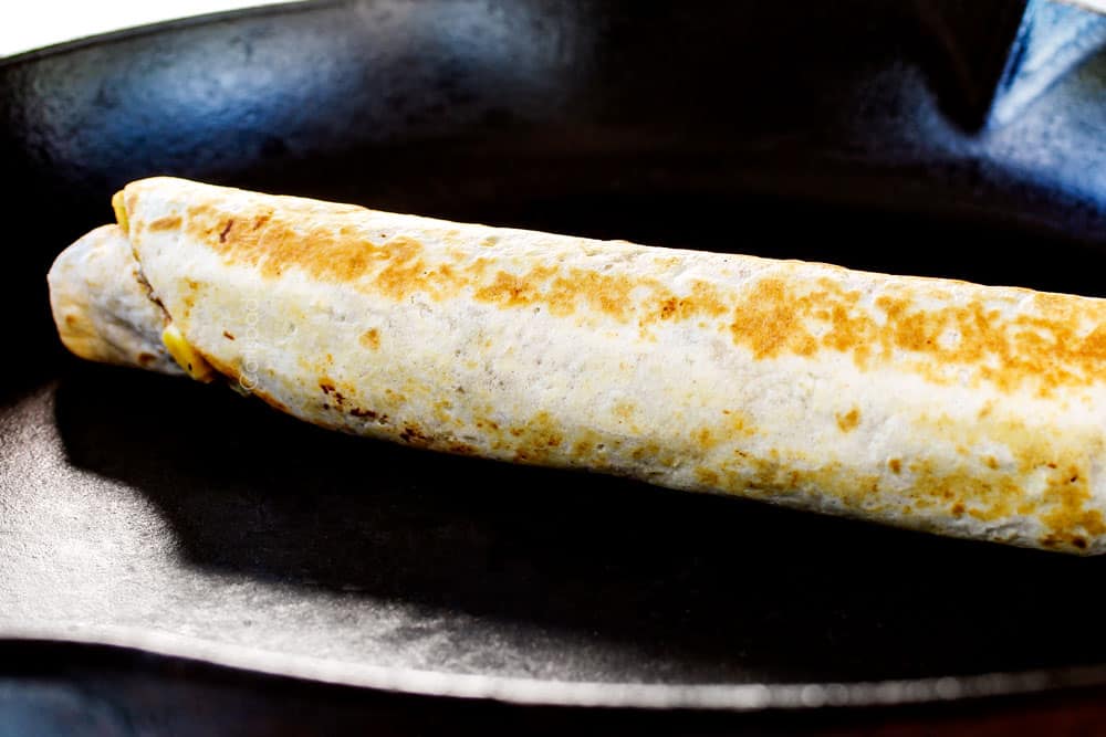 showing how to make pinwheels by toasting the roll ups in a skillet