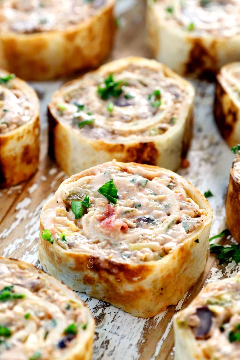 pinwheels on a plate showing how thick to slice them