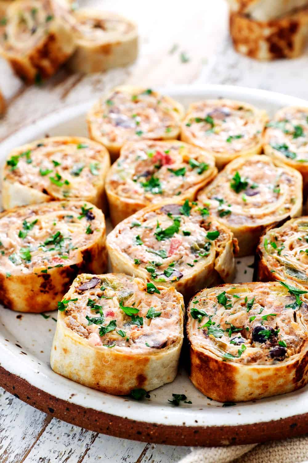 pinwheels on a plate showing how thick to slice them