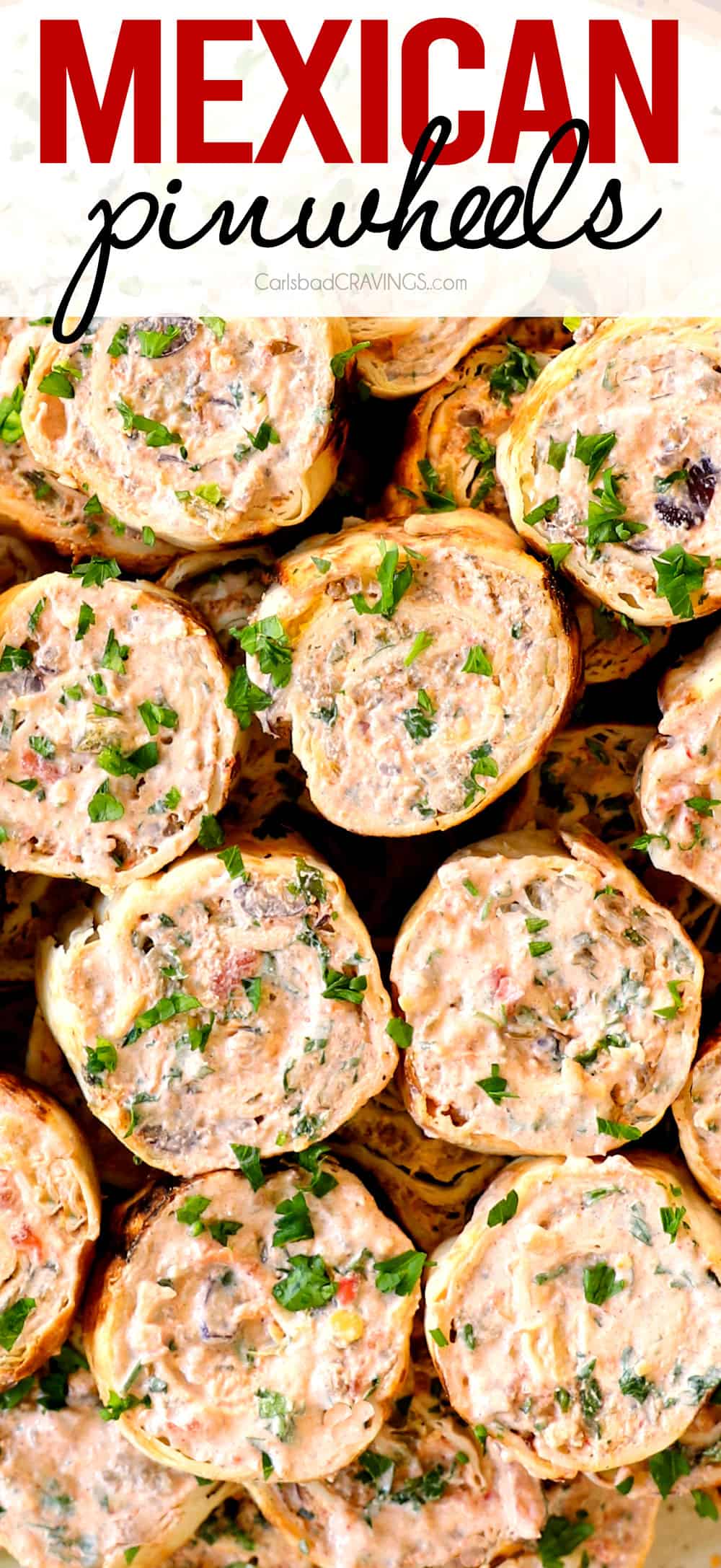 top view of Mexican cream cheese pinwheels on a tray showing how creamy they are