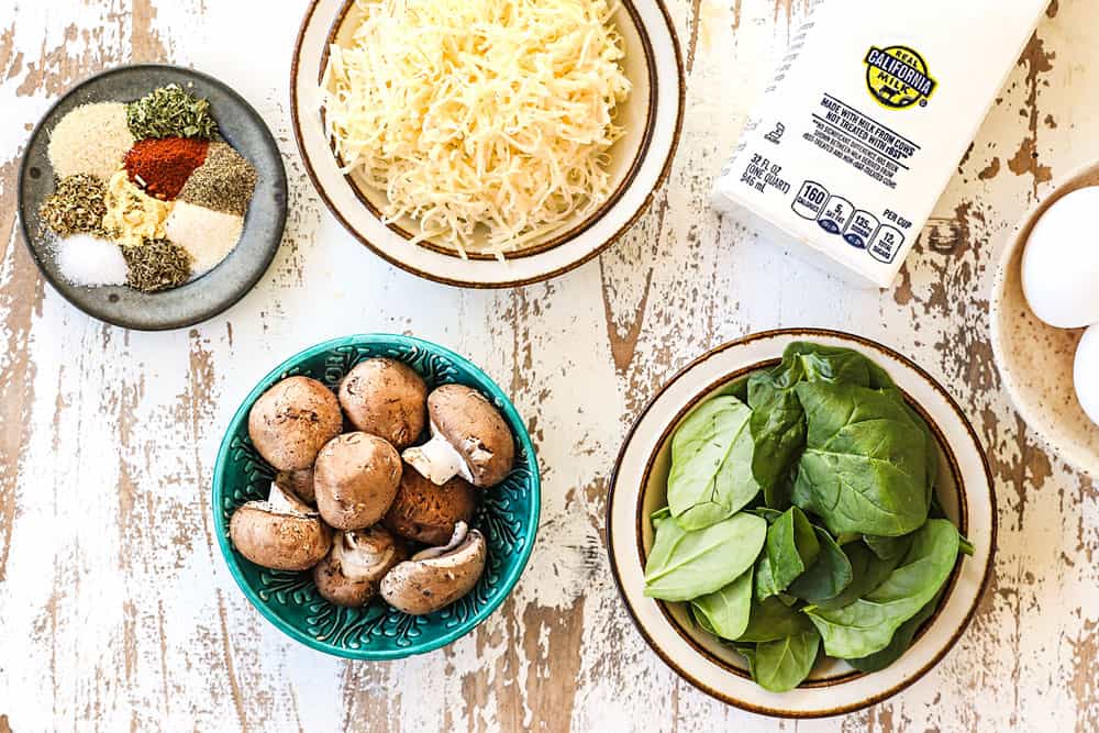 showing ingredients for mushroom spinach quiche with Gruyere, spinach and mushrooms
