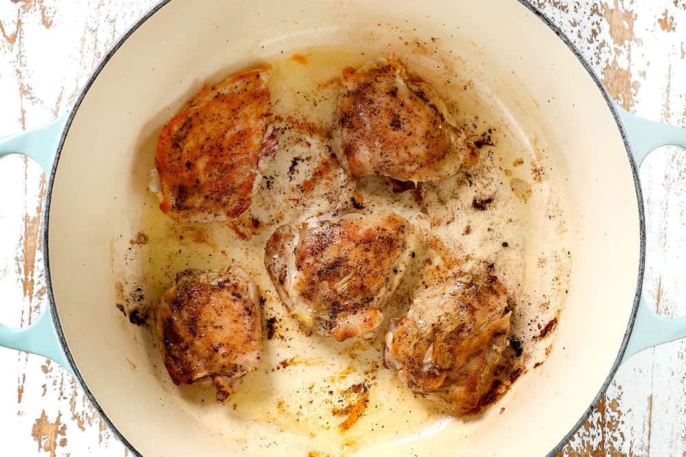 showing how to make chicken chili recipe by searing chicken in a Dutch oven until golden