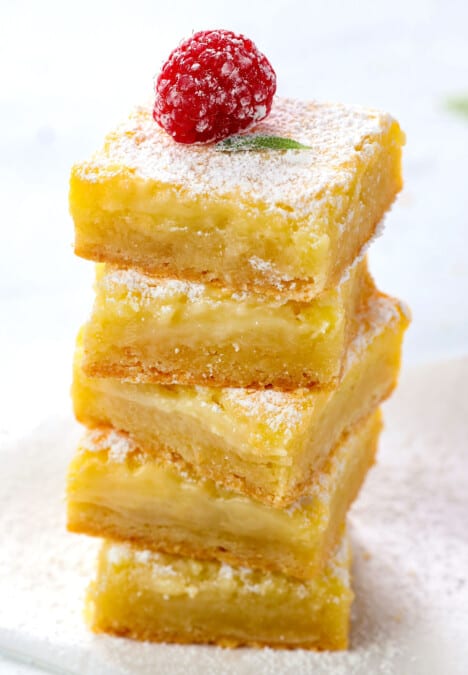 a stock of Ooey Gooey Butter Cake cut into squares