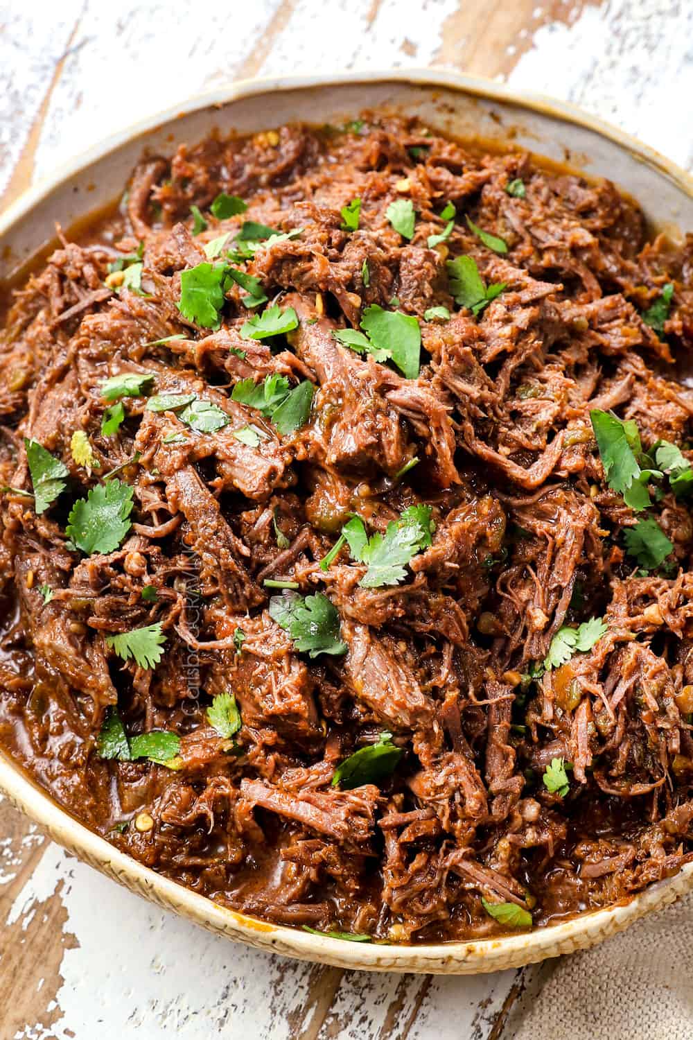 up close of juicy shredded beef for tacos showing how juicy it is