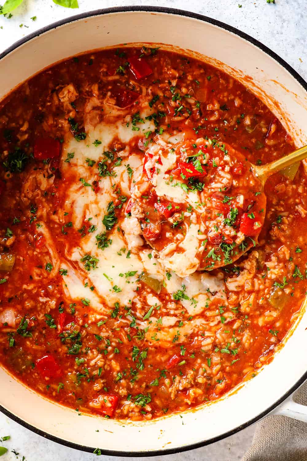 top view of stuffed pepper soup recipe showing the rice and sausage and bell peppers