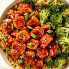 top view of apricot shrimp in a bowl with broccoli and rice showing how to serve it