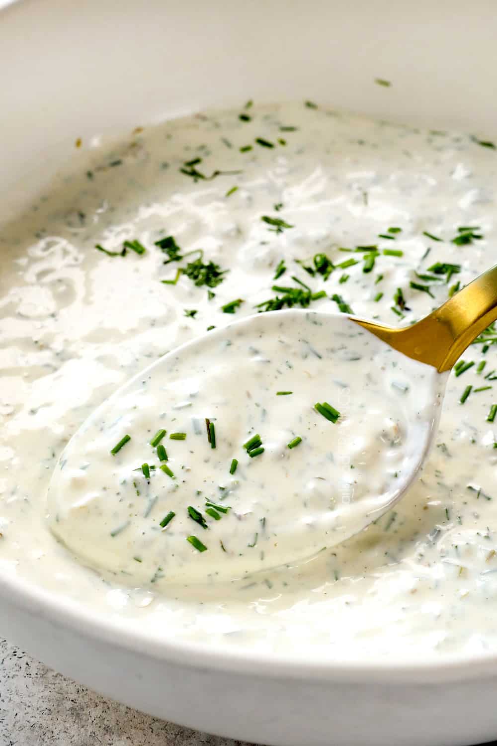 showing how to make tartar sauce by mixing all of the ingredients in a bowl until smooth