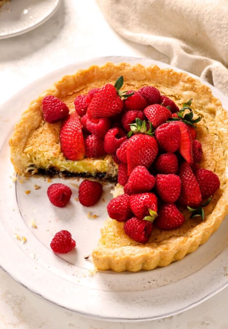 a few slices missing from coconut pie showing the custard filling