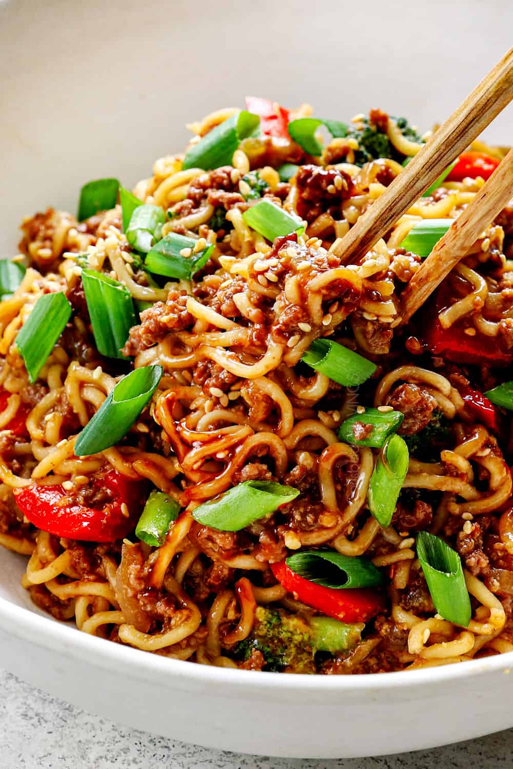 up close of ramen noodles with ground beef showing how saucy it is
