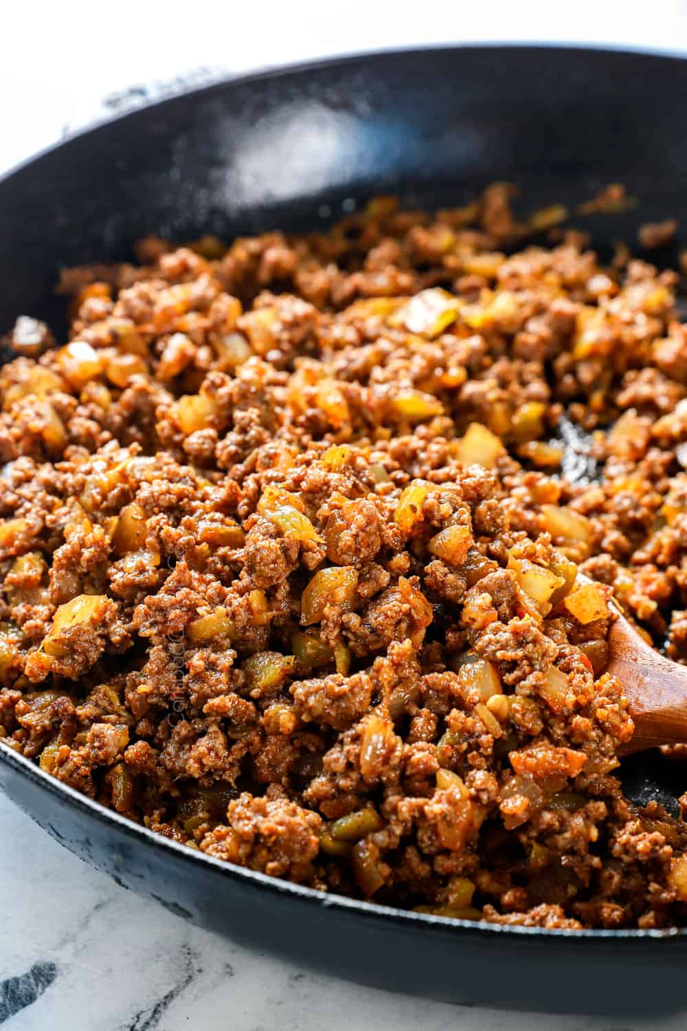 up close of making the juicy ground beef recipe for beef burritos recipe