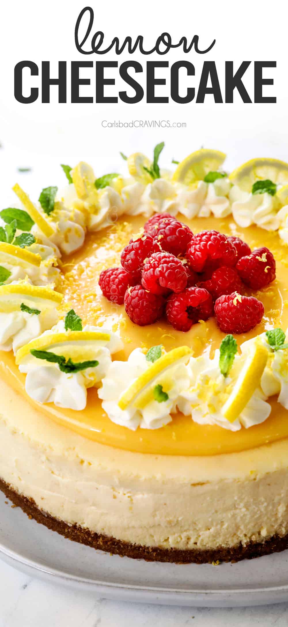 Lemon cheesecake on a white plate with lemon curd topping