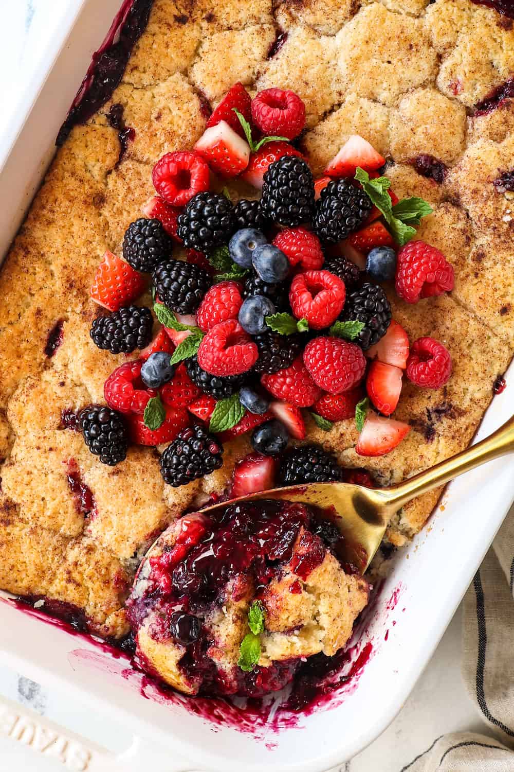 top view of berry cobbler recipe showing the biscuit topping