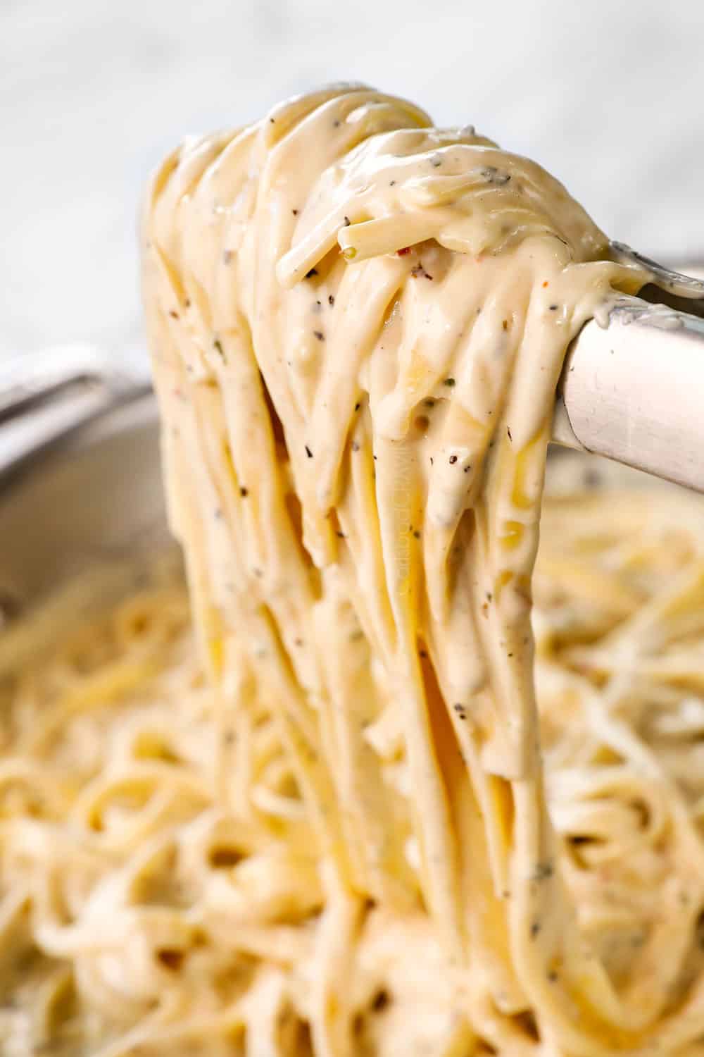 alfredo recipe by combining the Alfredo sauce with the fettuccine
