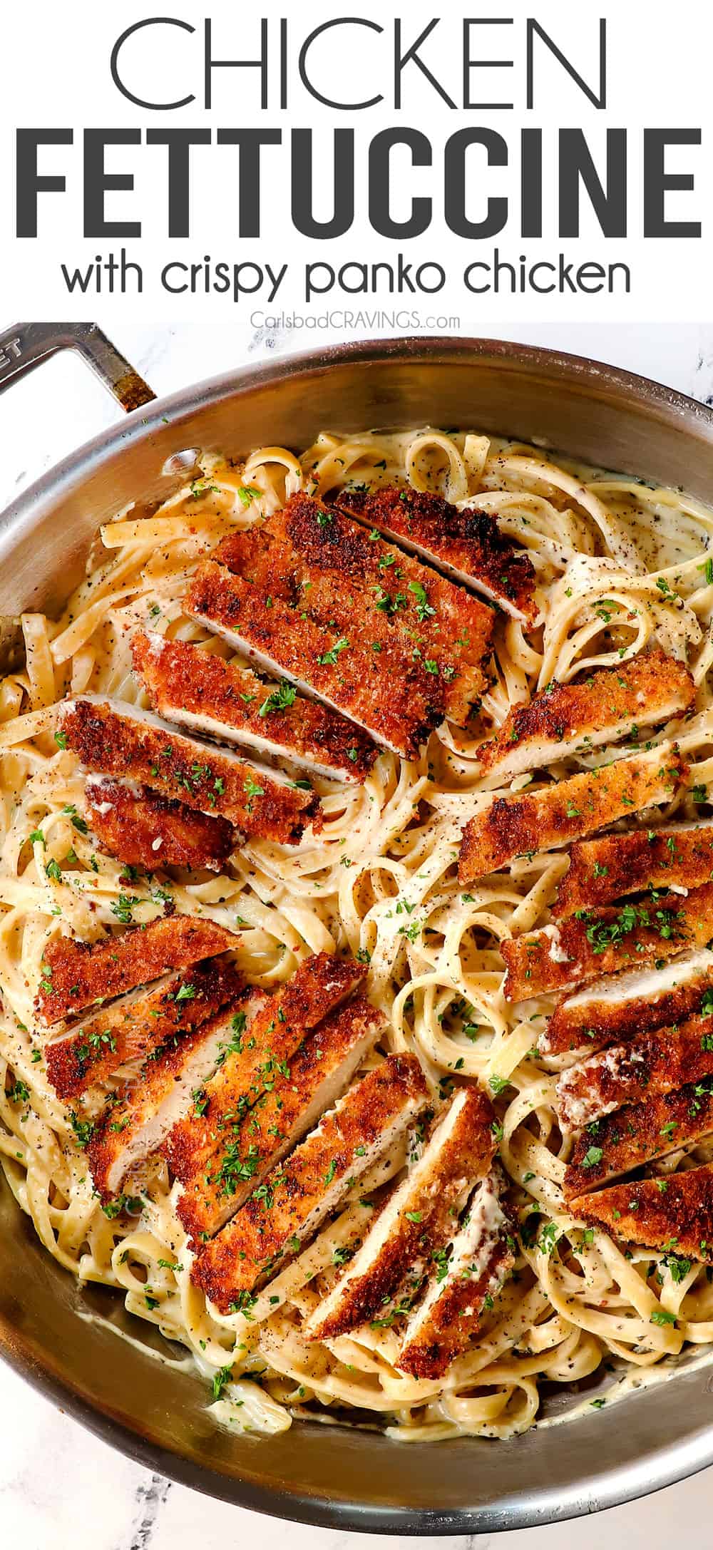 top view of chicken fettuccine alfredo with crispy panko chicken