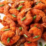 a plate of firecracker shrimp coated in panko
