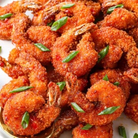 a plate of firecracker shrimp coated in panko