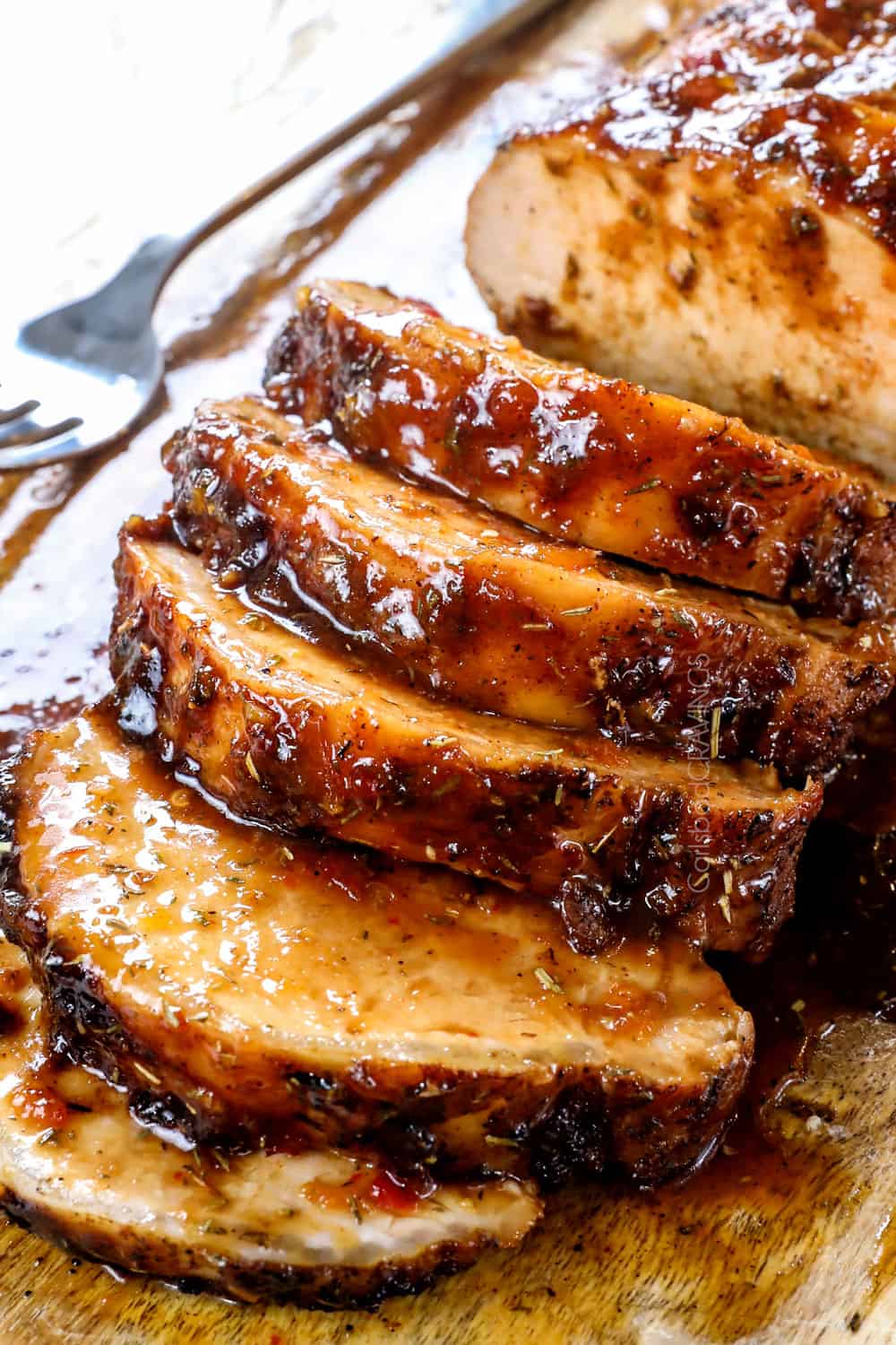 slicing roasted pork loin across the grain