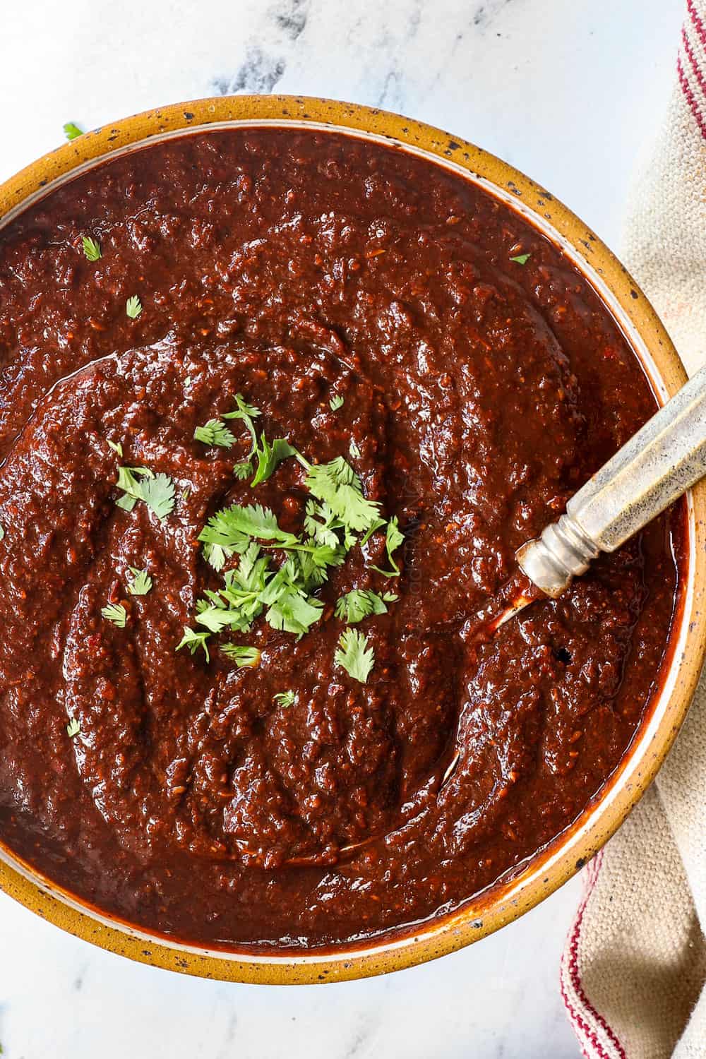 top view of spicy adobo sauce recipe in a bowl showing how thick it is