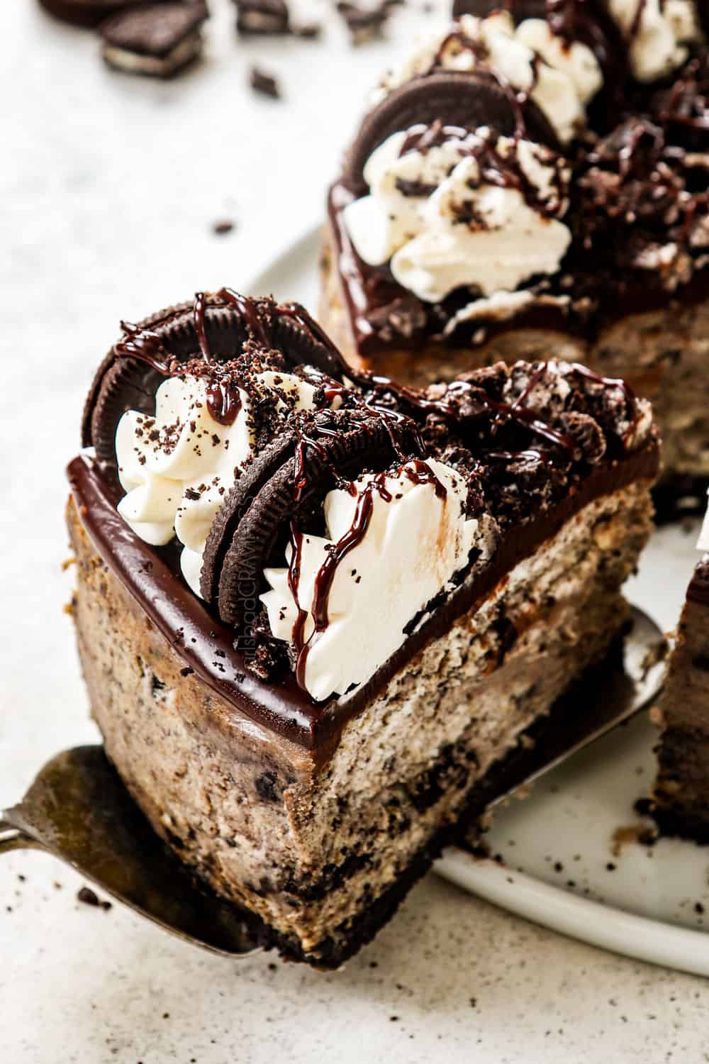 front view of a piece of Oreo cheesecake showing how creamy it is