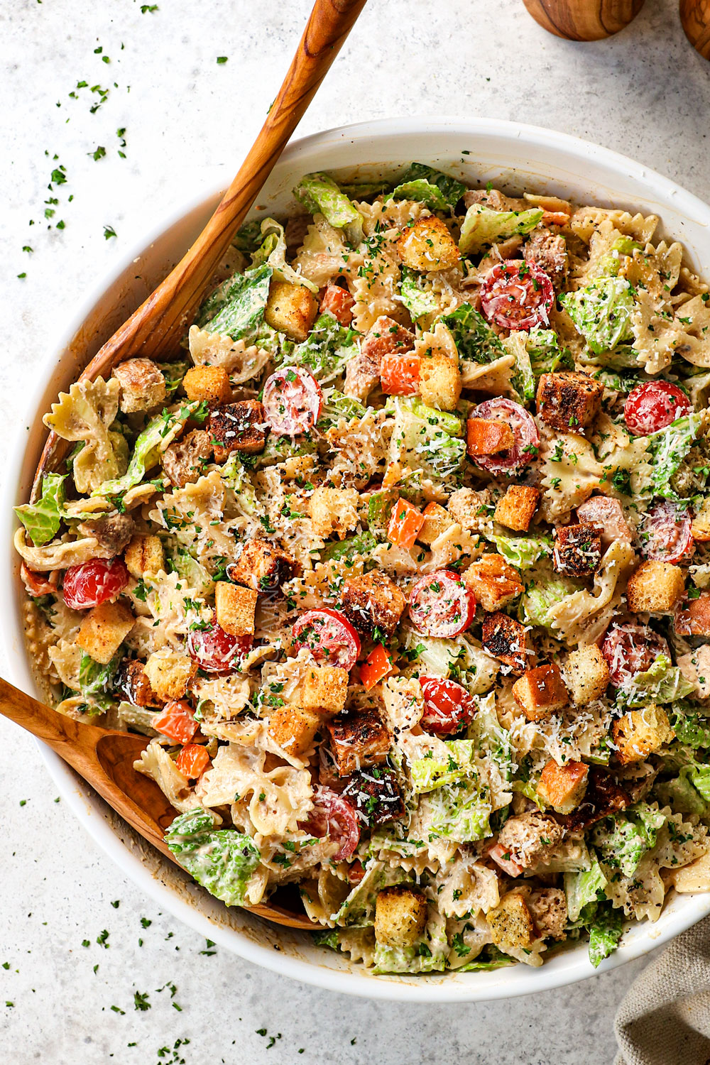 top view of Caesar Pasta Salad with chicken, Parmesan, Romaine and Caesar Dressing with chicken