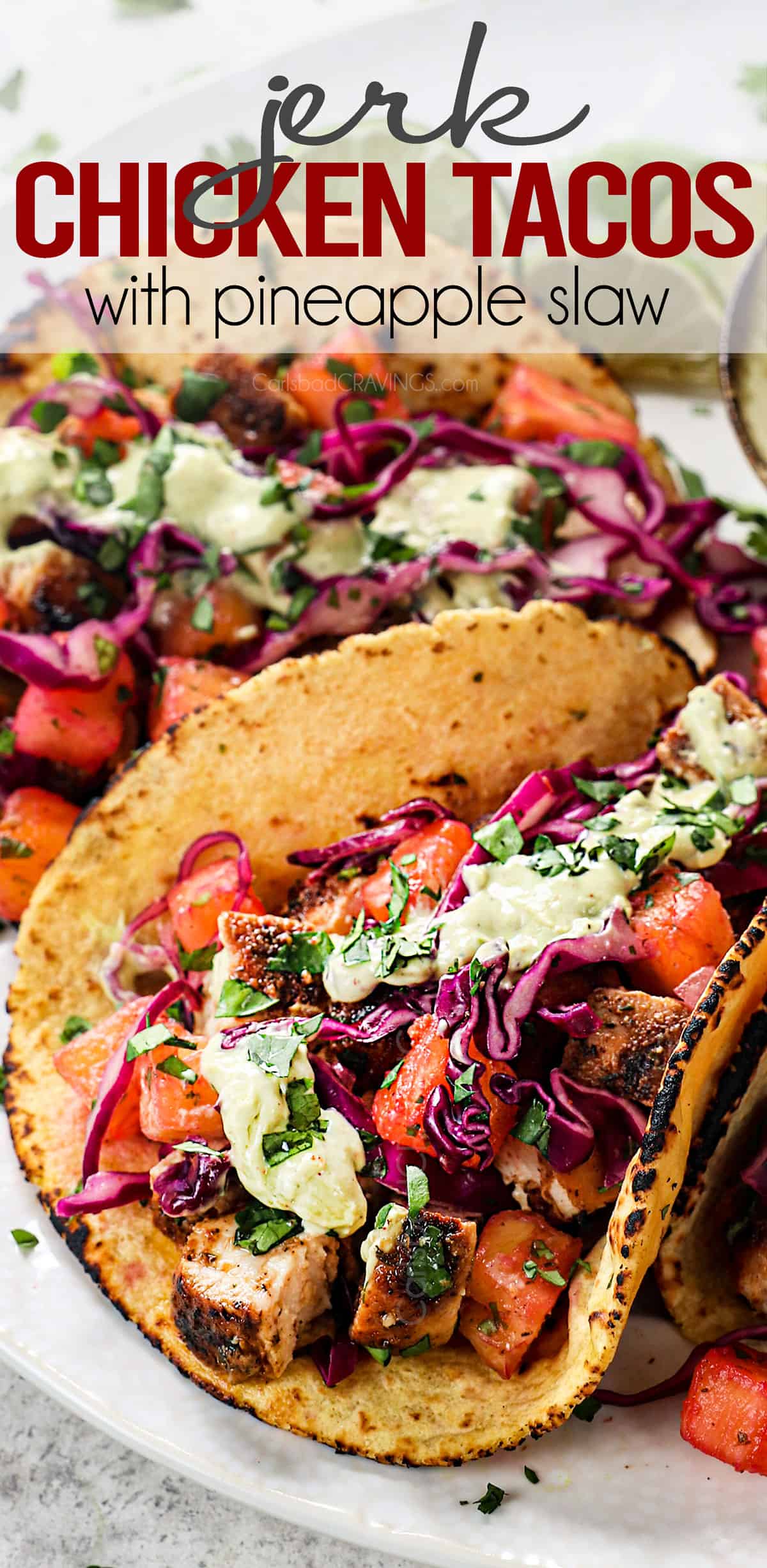 up close of jerk chicken tacos with jerk seasoned chicken