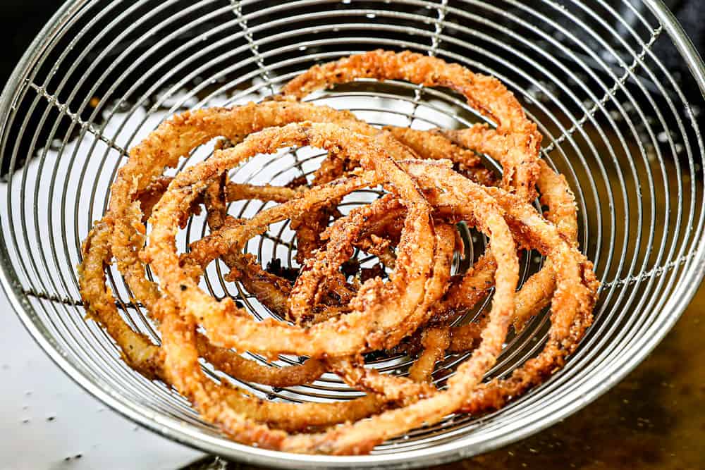 showing how to make BBQ pulled pork sandwiches by frying until golden in oil