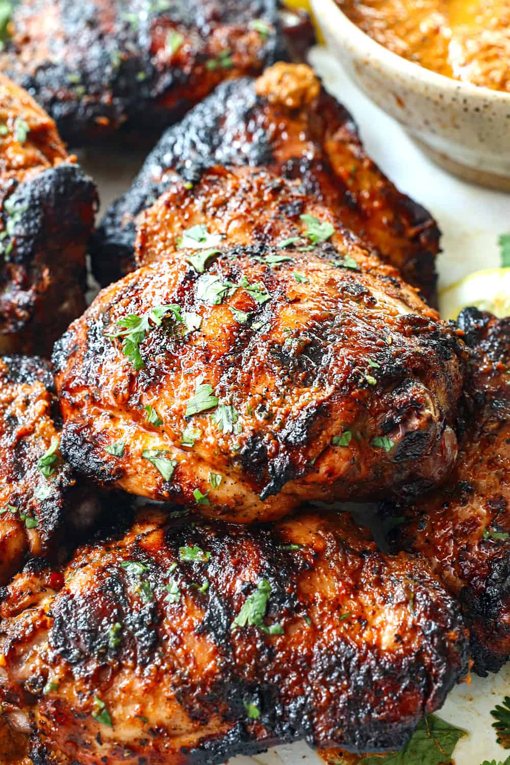 up closer of peri peri chicken recipe made with bone in chicken thighs