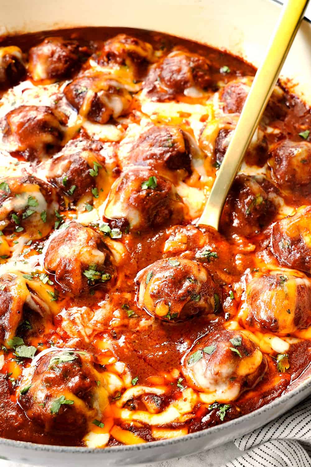 enchilada meatballs covered in cheese