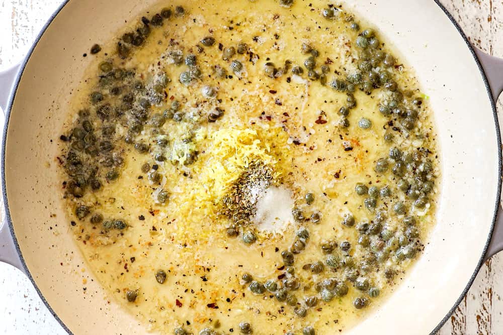 showing how to make lemon pasta (pasta al limone) by adding starchy pasta water, lemon juice and lemon zest to the butter and garlic