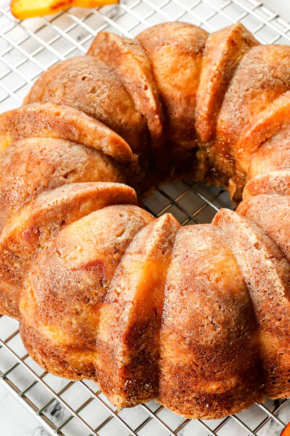 showing how to make peach cake recipe by chilling the pound cake on a baking sheet