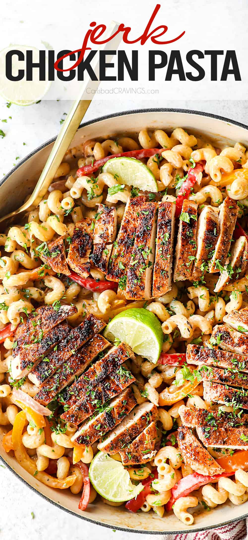 top view of jerk chicken pasta (Rasta pasta) with chicken in a creamy sauce