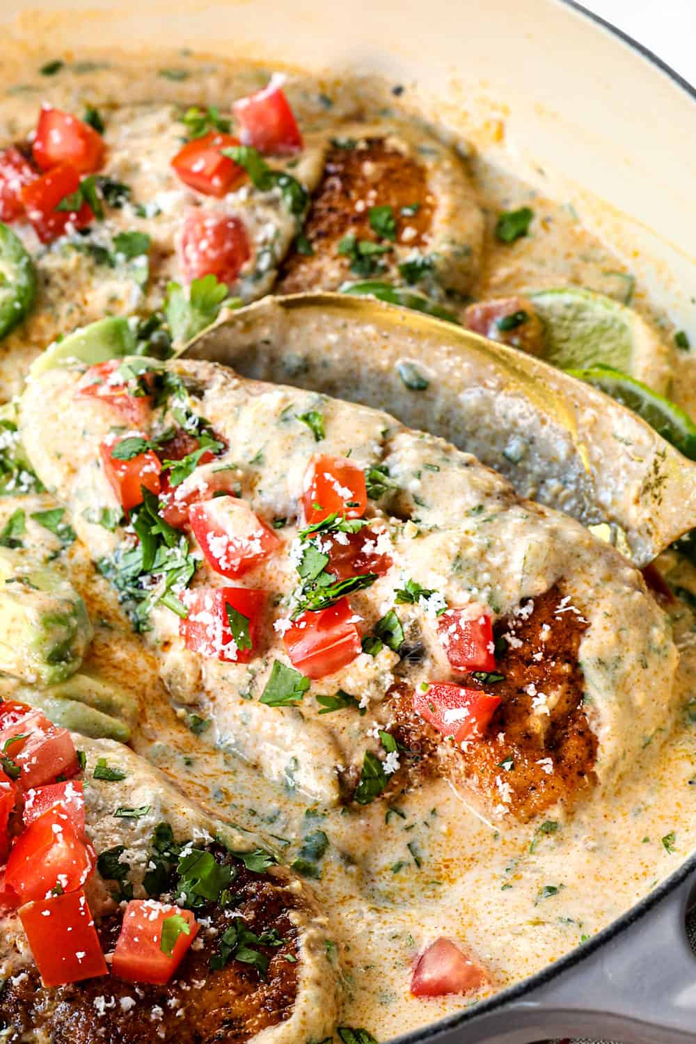 up close of smothered chicken recipe showing how juicy the chicken is