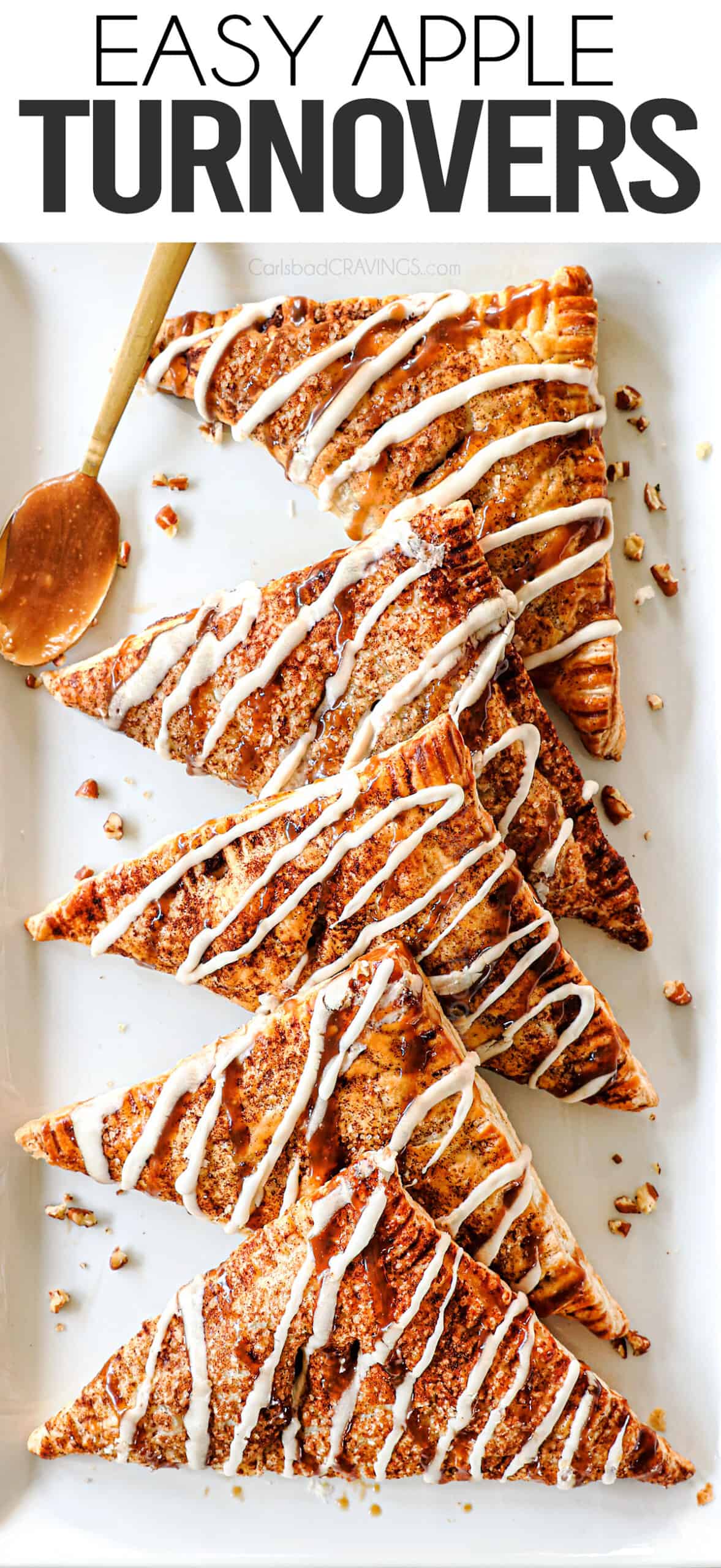 apple turnovers lined on a platter showing how puffy and flaky they are
