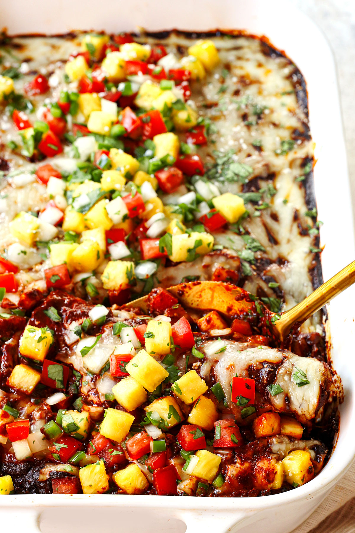 up close of serving chicken mole enchiladas