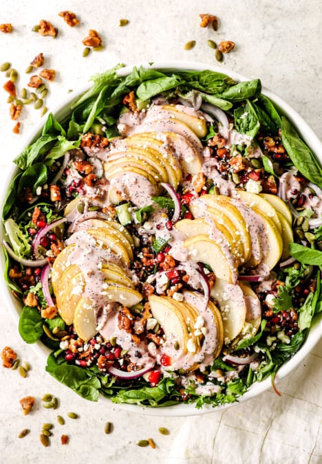 up close of serving pear salad with gorgonzola in a white bowl